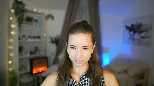 Shy_jane on MyFreeCams, sexy shy brunette in black top smiling at cam