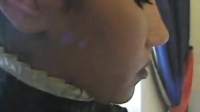 Ponygirl in leather collar and ruffled neck harness closeup profile view