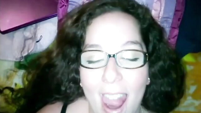 Hot brunette wife in glasses opens mouth wide for facial cumshot