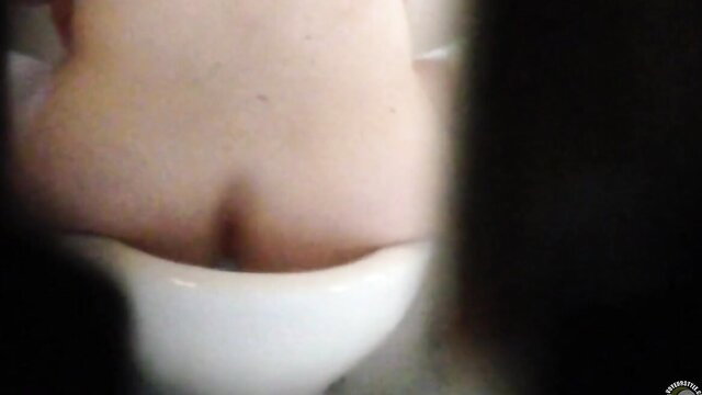 Aunt spied on sitting naked on toilet with saggy tits visible