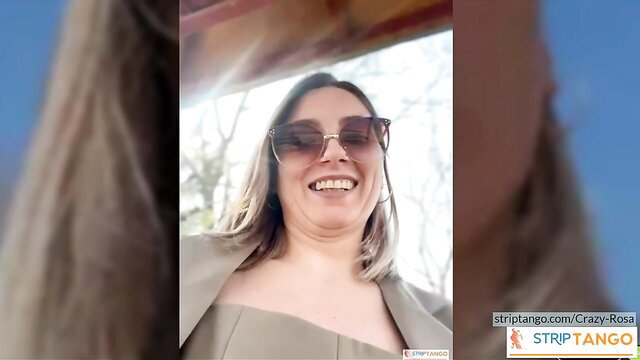 Crazy-Rosa smiles provocatively in sunglasses at stripTango showcase