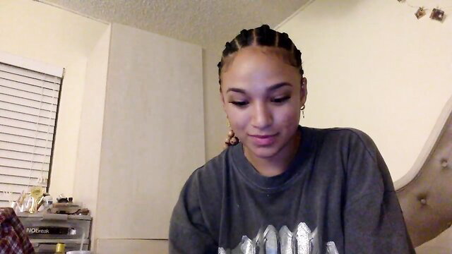 lmaobye123 sexy mixed girl with braids smiling closeup Chaturbate