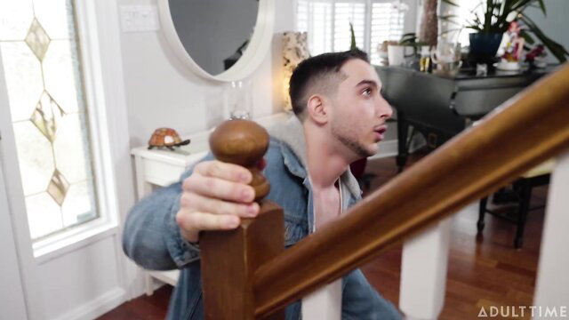 Young guy gripping stair post in surprise, Adult Time porn thumbnail