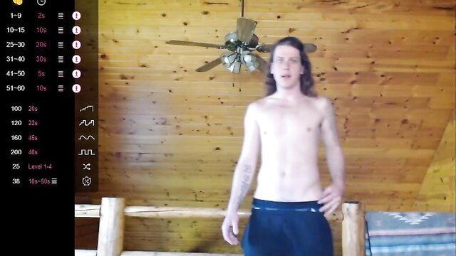 Shirtless long-haired white guy with tattoos in low pants, amateur gay thumbnail