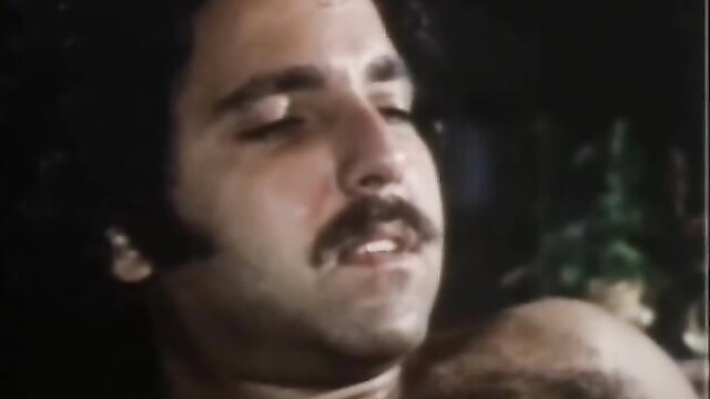 Vintage 70s porn closeup of mustached man's ecstatic face during sex