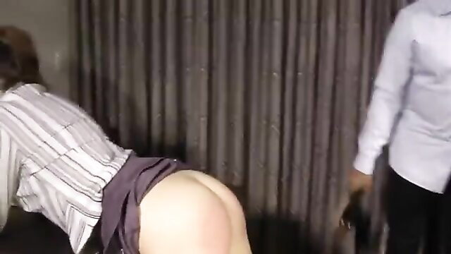 Woman bent over skirt up exposing big pale ass for spanking