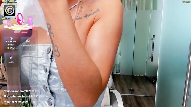 Sensual Latina teases in shiny denim top with tattoos live cam