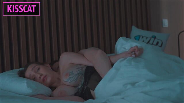 Asian stepmom in lingerie sleeping topless with tattoos on shared bed