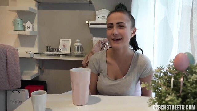 Czech Streets busty 18yo amateur Denisa smiling in gray top