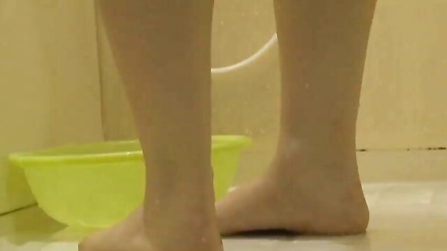 Asian girl squatting nude over potty peeing in amateur JAV scene