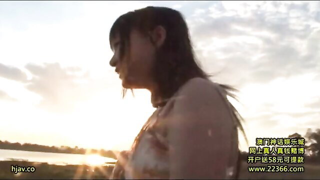 Eri Natsume wet dress silhouette at sunset lake, JAV tease
