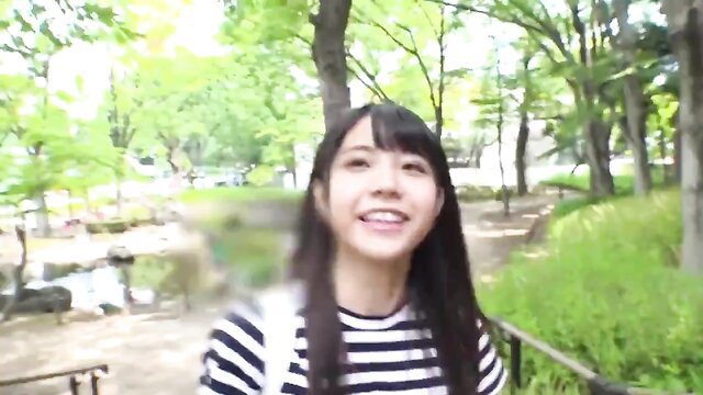 Cute Japanese petite teen smiling in park, absolute perfection
