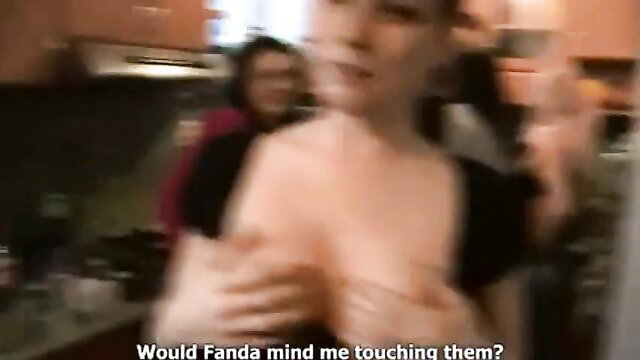 Blurry amateur Asian woman exposing huge tits in home orgy scene