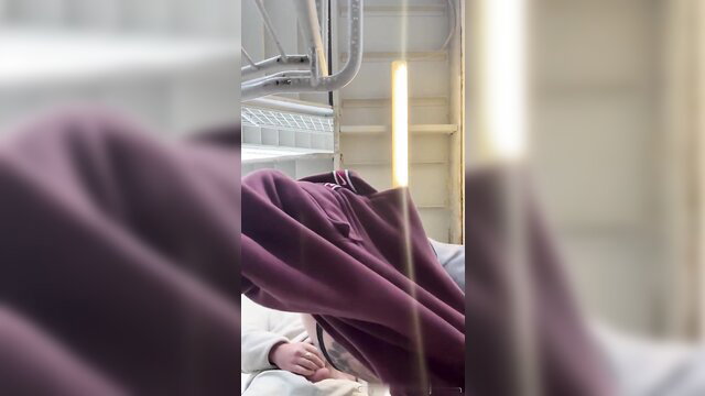 Mystery Stairwell Slut in purple hoodie teasing in dim light