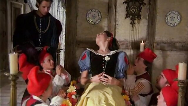 Snow White surrounded by 7 dwarfs in sexy fairy tale porn scene