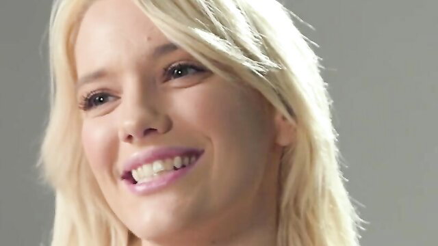 Smiling blonde bombshell Kenna James in raunchy cougar tease