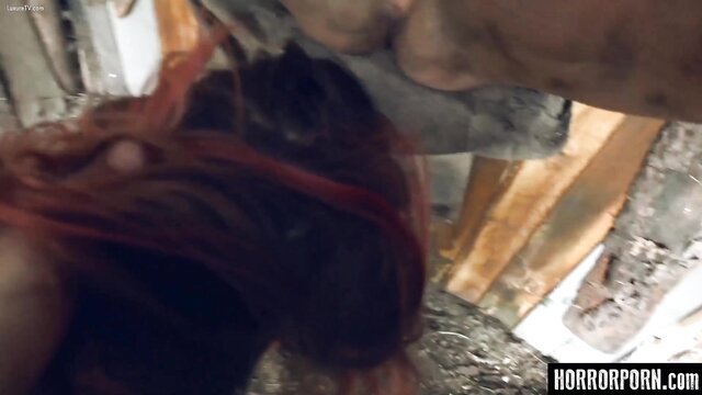 Horror Porn: Redhead woman gripped by beast hands in woods terror