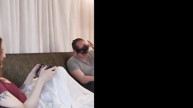 Redhead amateur babe gives blowjob to VR guy on couch