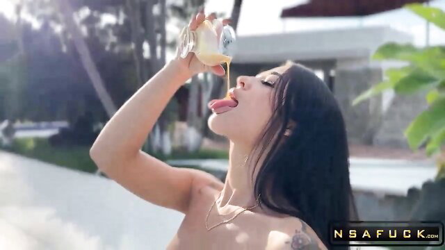 Hot Asian stepsister with big tits tongue out drinking milk topless