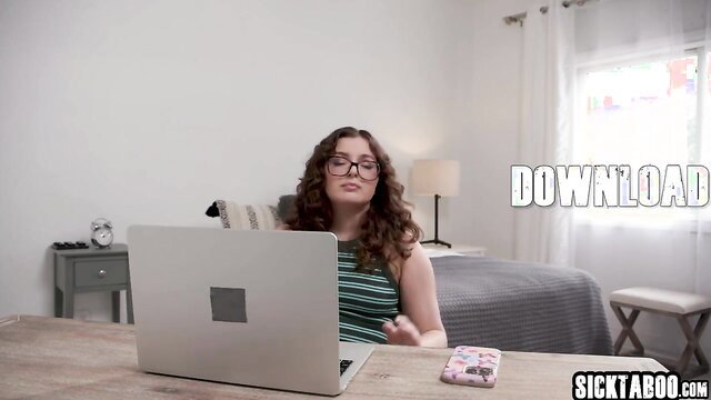 Leana Lovings curvy teen with big tits at laptop in tank top