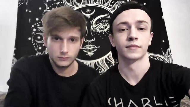 Two young white twinks posing shirtless in front of tapestry, amateur gay thumbnail