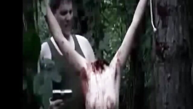 Elite Pain: Man crucified naked on tree with blood, intense BDSM torture