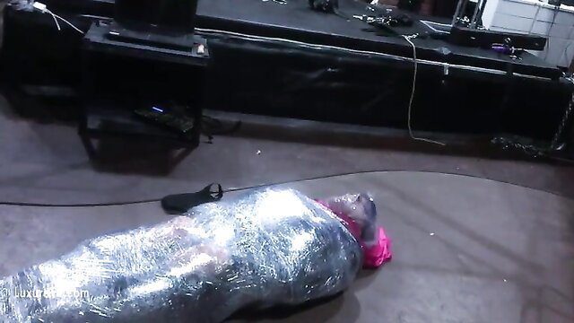 Goddess Nemesis mummifies her slut in tight saran wrap bondage
