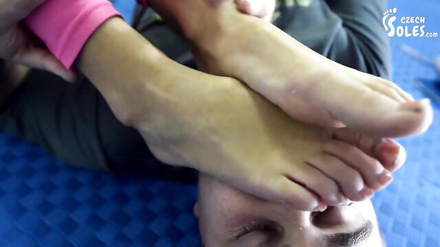 Gym trainer sniffs client's bare soles and pink sweaty socks in foot worship