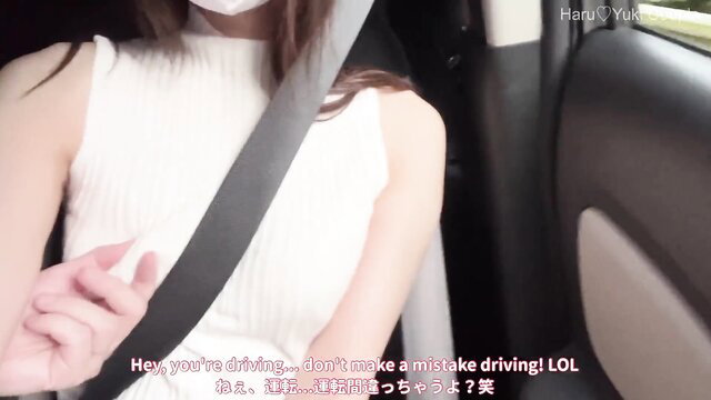 Haruyukicouple Asian girl in car, seatbelt over tits, laughing