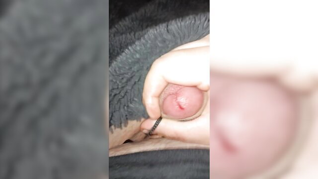 Hand spreading furry pussy lips with ring, huge cumshot buildup