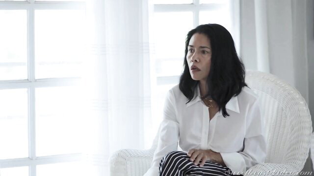 Cherry Kiss in white blouse and skirt, seductive gaze