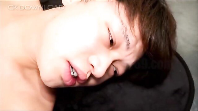 Asian twink's intense close-up face during thrilling gay sex training