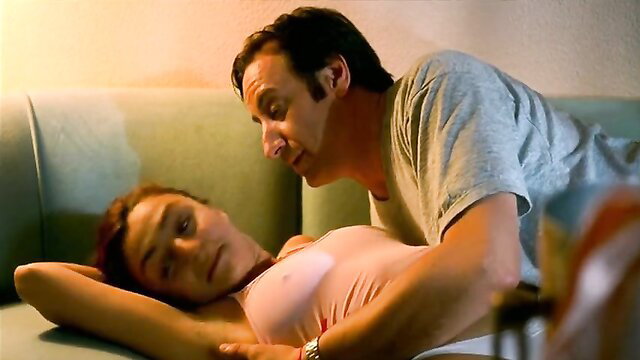 Candela Pena nude tits exposed in intimate couch scene from Novios (1990)