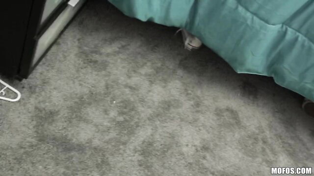 Ashly Anderson peeking from under bed in sexy lingerie