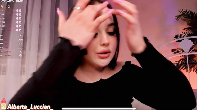 Curvy dark-haired Chloeattwood covers face teasing on cam