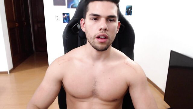 Hot Latino new model shirtless in gaming chair, gay cruising tease
