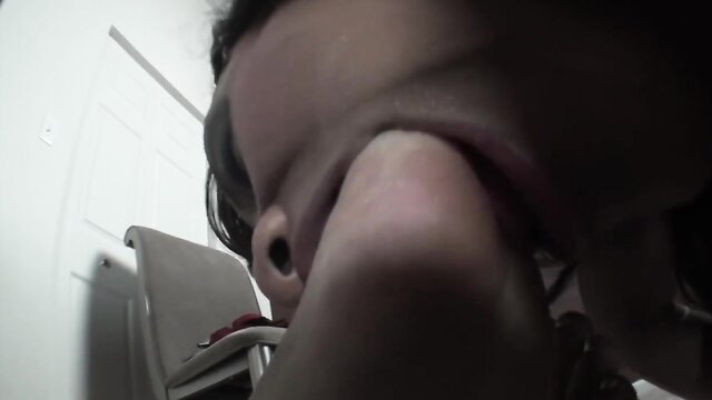 Ebony woman closeup face in foot fetish lesbian passion