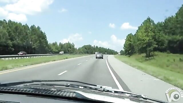 Girlfriend topless driving down sunny highway, bare tits exposed