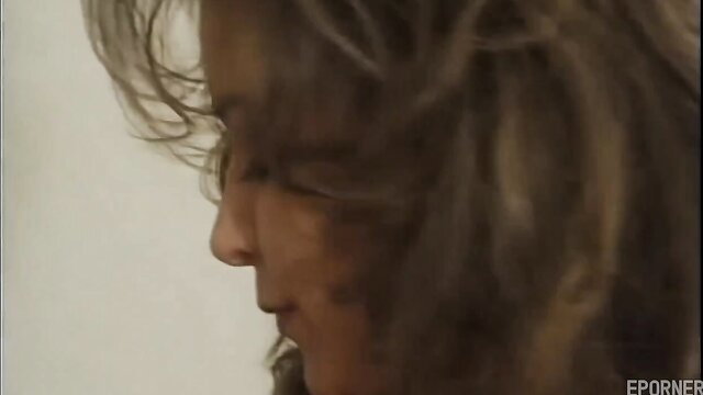 Vintage MILF with wavy brown hair in seductive profile pose