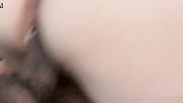 Blurry closeup of woman's pale ass and thighs during hardcore ride