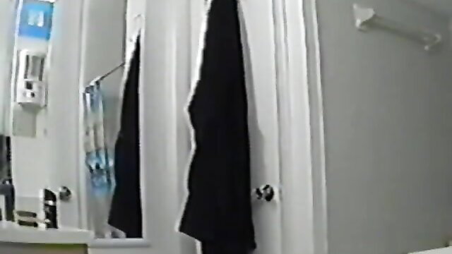 Chubby aunty reveals big melons in bathroom mirror tease