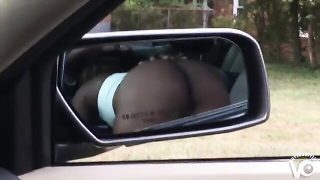 Stunning closeup of thick black ass in car mirror reflection