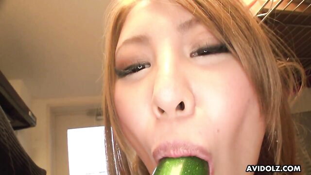 Mariru Amamiya sucking cucumber closeup JAV thumbnail