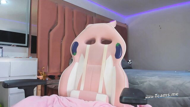 Petite busty trap jerks off on live in pink gaming chair