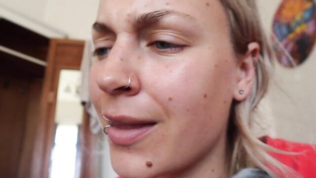 Closeup of blonde woman with piercings in Jack and the Beanstalk adult parody