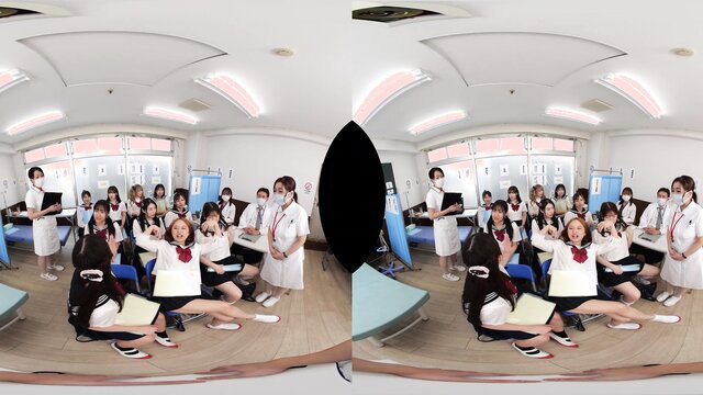 Group of cute Japanese schoolgirls in white shirts with nurses teasing in classroom