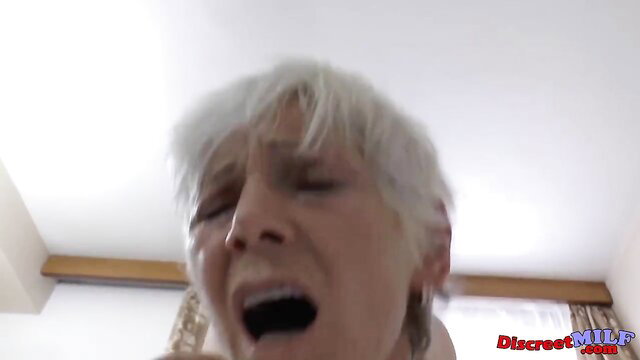 Old granny with white hair crying, wide mouth open in ecstasy POV