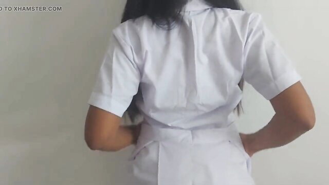 Sri Lankan school girl in tight white nurse uniform showing big ass from behind