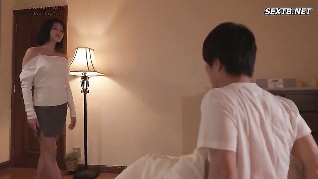 Asian woman in off-shoulder top and mini skirt stands before man in Japanese cheating scene