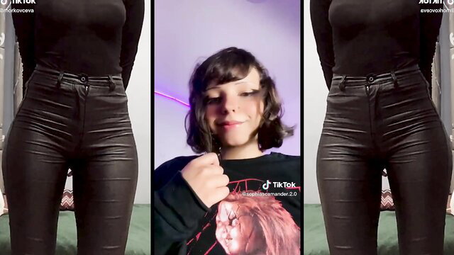 Hot TikTok girl in tight black leather pants and Chucky hoodie splitscreen tease